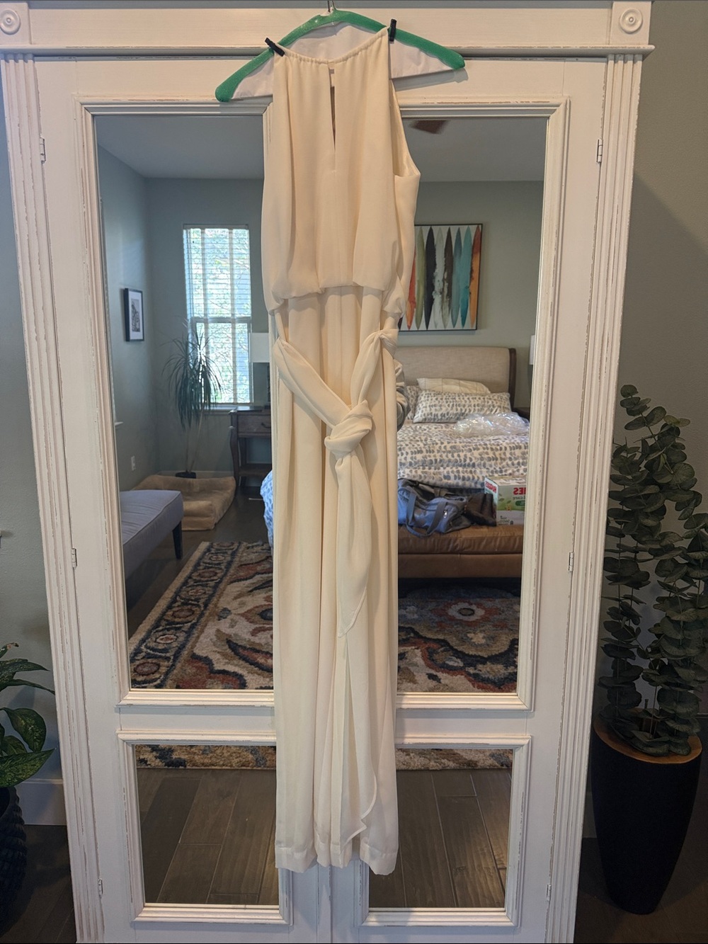 Elegant Cream Sleeveless Pantsuit with Waist Tie